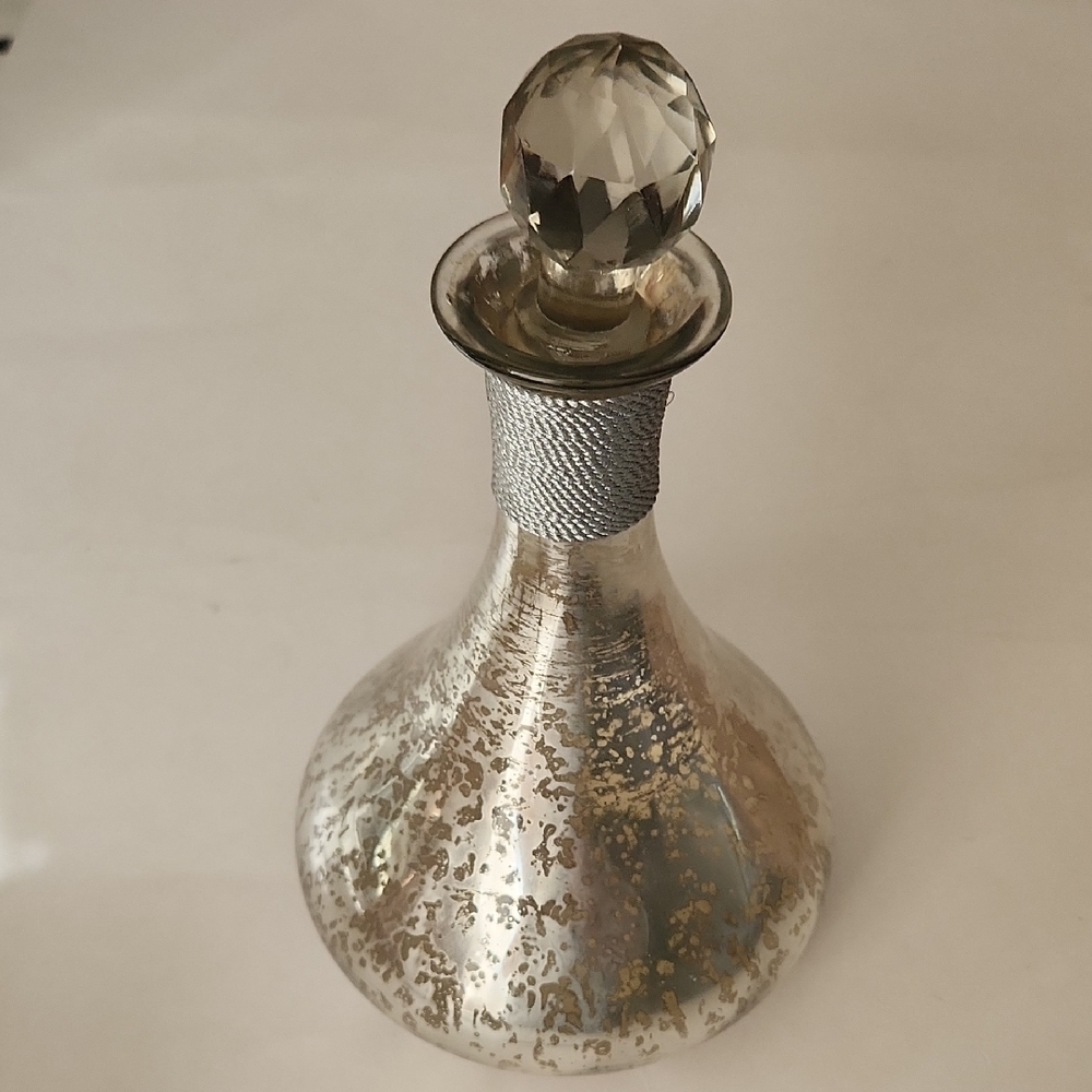 Elegant Silver and Gold Decorative Bottle